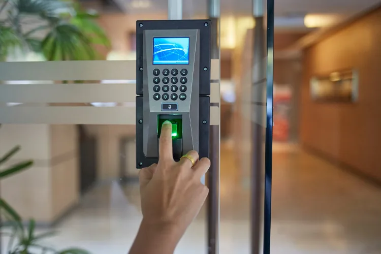Employee using an access control keypad at a New York business
