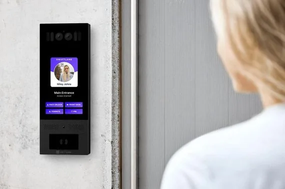 Swiftlane facial recognition and mobile access reader at a touchless building entry.