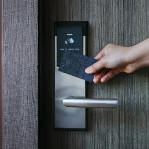 Locksmith upgrading a home lock for better protection in NYC