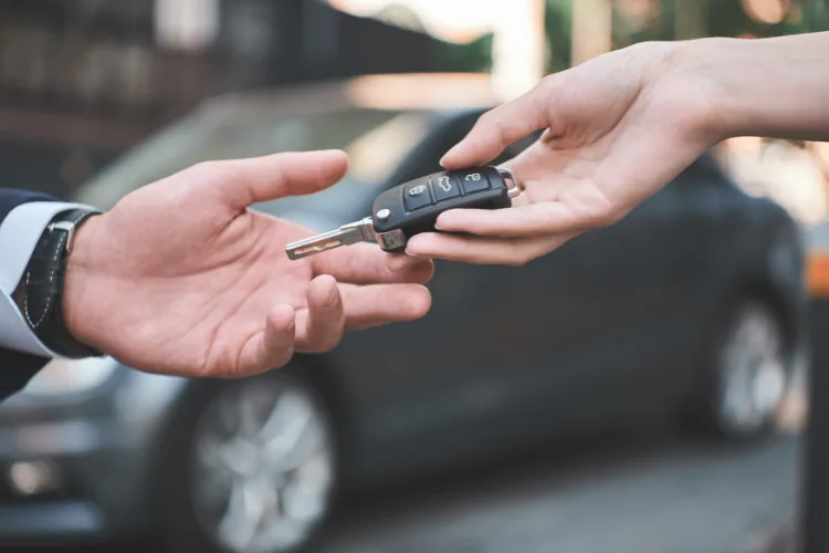 Locksmith programming a new car key fob in NYC