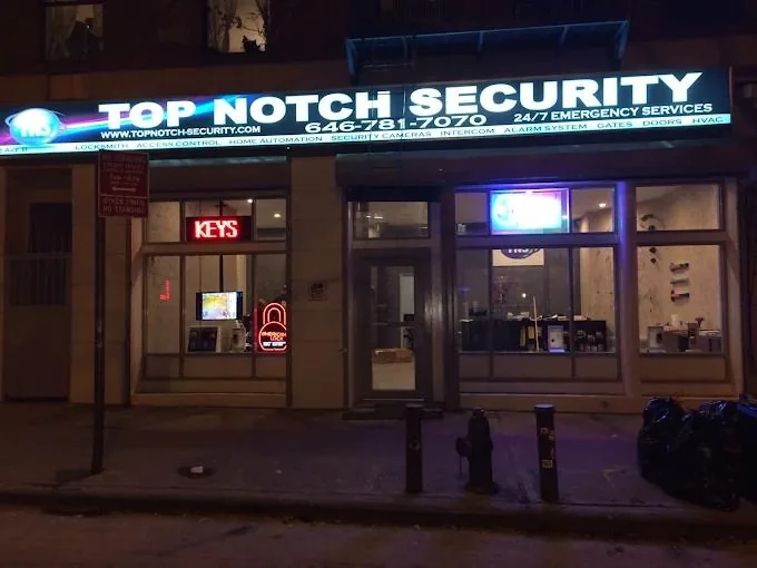 Top Notch Locksmith & Security storefront in New York City at night